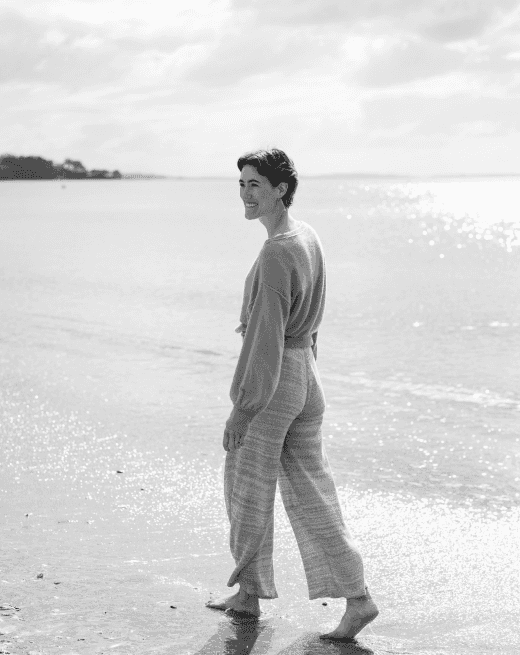 Elle walking on beach